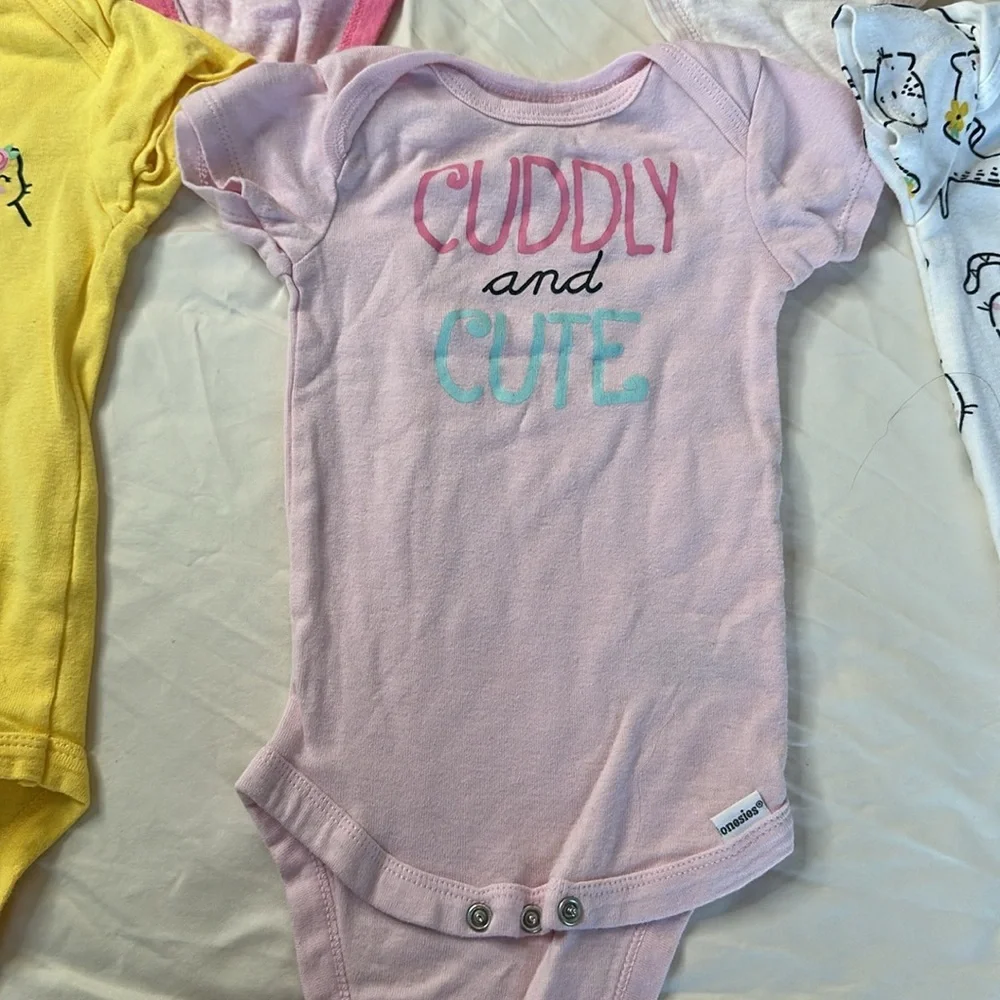 Onesie brand set of 7, size 6-9 month short sleeve bodysuits. GREAT CONDITION.